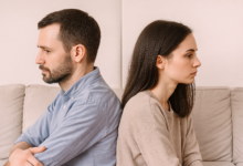 Man and woman facing apart